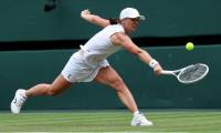 PIX: Swiatek outplays Collins; Andreeva advances too