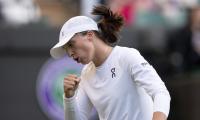 'Hard to beat', Swiatek finds love for Wimbledon grass