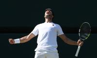 PIX: Alcaraz grinds past Fritz to reach Wimbledon final