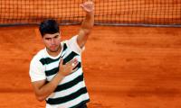 PIX: Alcaraz flattens Paul; Musetti ousts Tiafoe