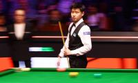 PIX: Back from ban, China's Zhao is World snooker champ