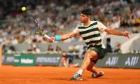 PIX: Alcaraz stumbles into French Open fourth round