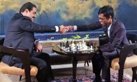 Praggnanandhaa plays chess with Gautam Adani