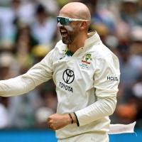 Nathan Lyon celebrates the wicket of Ravindra Jadeja.