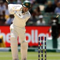 Alex Carey is bowled by Jasprit Bumrah.