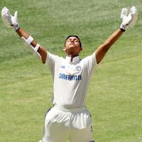 Yashasvi Jaiswal celebrates his century.