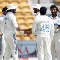 India's players celebrate after Jasprit Bumrah got the wicket of Tom Blundell.