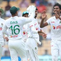 Bangladesh's players celebrate the wicket of Shubman Gill