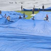 The Green Park Stadium under covers because of rain.