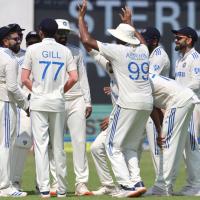 India's players celebrate the wicket of Litton Das, who was caught by Rohit Sharma off the bowling of Mohammed Siraj.