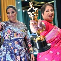 Kartiki Gonsalves and Guneet Monga at the Oscars