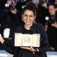 Payal Kapadia with her Grand Prix award, May 25, 2024/Sarah Meyssonnier/Reuters