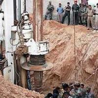 File pic. A tunnel being dug to rescue a child from a borewell