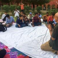 Harsh Mander interacting with people during his Karwan-e-Mohabbat yatra in 2017