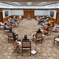 A union cabinet meeting in March: Distancing but no masks