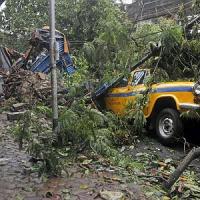 Mangled remains of vehicles pile up at a street in Kolkata