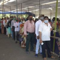People queue up to get vaccinated in Mumbai