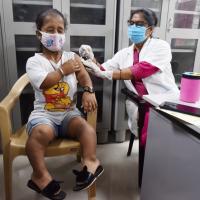 A person gets vaccinated in Praygaraj