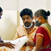 A Black Fungus patient's family checks the reports