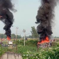 A vehicle set ablaze at Lakhimpur