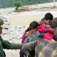 The helicopter airlifts stranded people from Sunder Khal village
