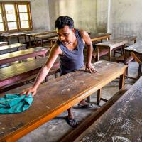 A classroom being cleaned after schools reopened in Guwahati