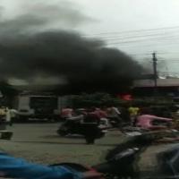 A video grab showing smoke bellowing out of the hospital building