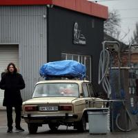 Residents of Ukraine tank up amid uncertainty and fear