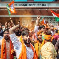 BJP workers celebrate the party's spectacular win in UP