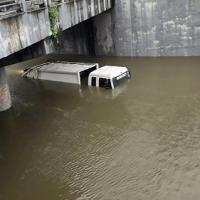 A vehicle submerged in the waterlogged underpass road in Chennai./ANI