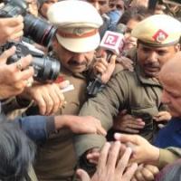 Manish Sisodia at the house of the victim