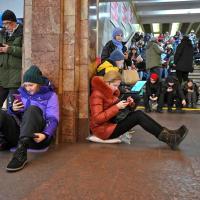 People take shelter at a metro station in Kyiv. Viacheslav Ratynskyi/Reuters