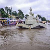 A partially submerged temple on the banks of the Narmada