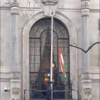 A screen grab taken from video of Khalistani supporters attempt to pull down tricolour at the high commission of India, in UK