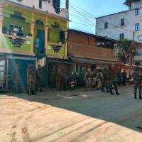 Army jawan stand guard in violence-hit area of Imphal town/PTI
