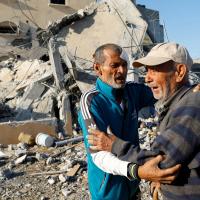 Palestinian loses his family in Israel bombing. Ibraheem Abu Mustafa/Reuters
