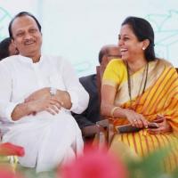 Ajit Pawar with his wife Sunetra, the candidate from Baramati