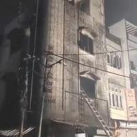 The building where fire broke out killing four of a family in Dewas, MP/ANI on X