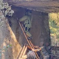 A jawan removing explosives from under a bridge in Manipur/ANI Photo