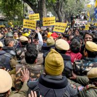 AAP supporters scuffle with police over the polls