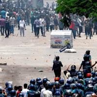 Police and protesters clash in Dhaka, Bangladesh/Mohammad Ponir Hossain/Reuters