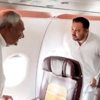 Nitish Kumar and Tejashwi Yadav on board a flight