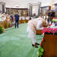 Narendra Modi bows before the Constitution