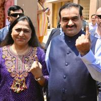 Mr and Mrs Adani vote