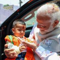 PM Modi with a young 'fan' in Telangana