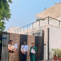 NCW officers outside Bibhav Kumar's residence