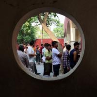 Voters line up to cast their votes outside a polling station in Sonipat, Haryana, May 25, 2024. Anushree Fadnavis/Reuters