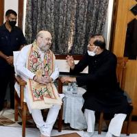 Pt Ajoy Chakrabarty with Amit Shah. File pic