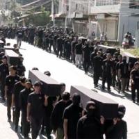 The empty coffin march by the Kukis. File pic