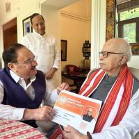 BJP chief JP Nadda hands over party membership certificate to veteran party leader LK Advani in New Delhi/ANI on X